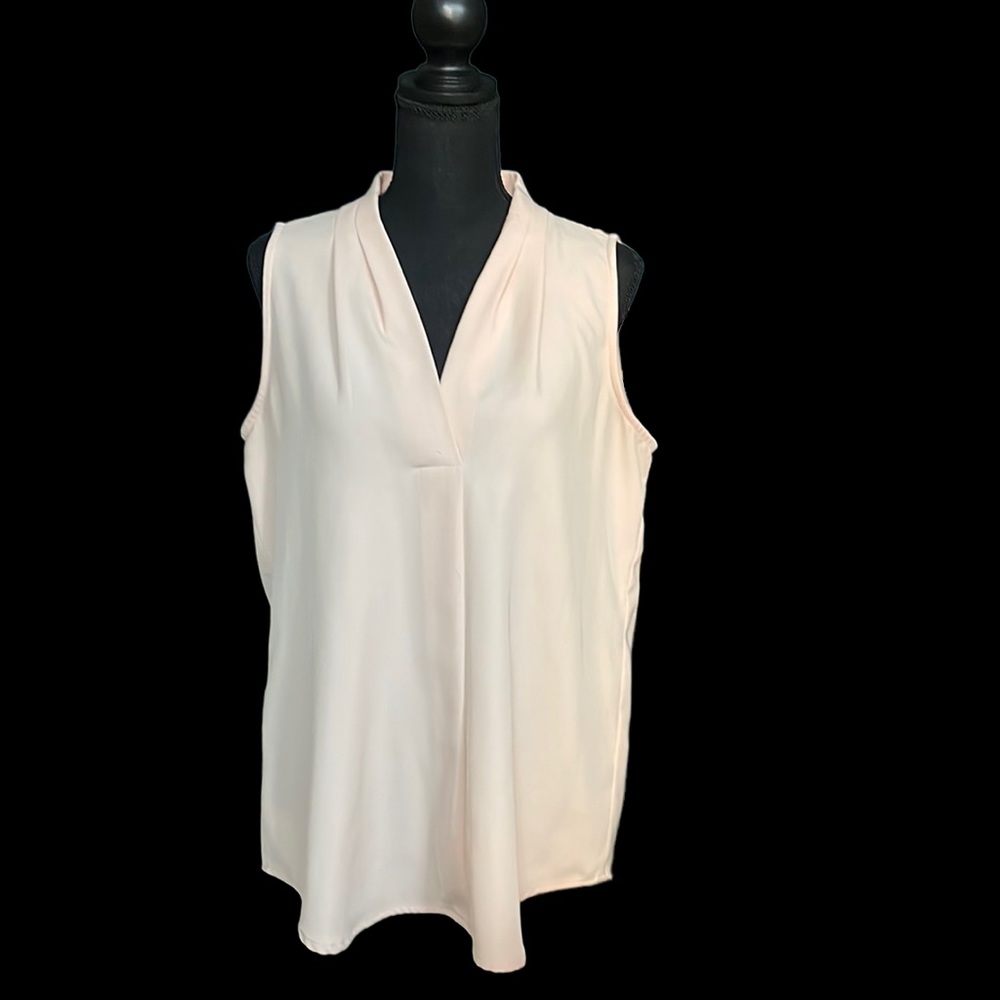 Calvin Klein sleeveless top, 96% poly, 4% spandex, dry clean only, peach blush.